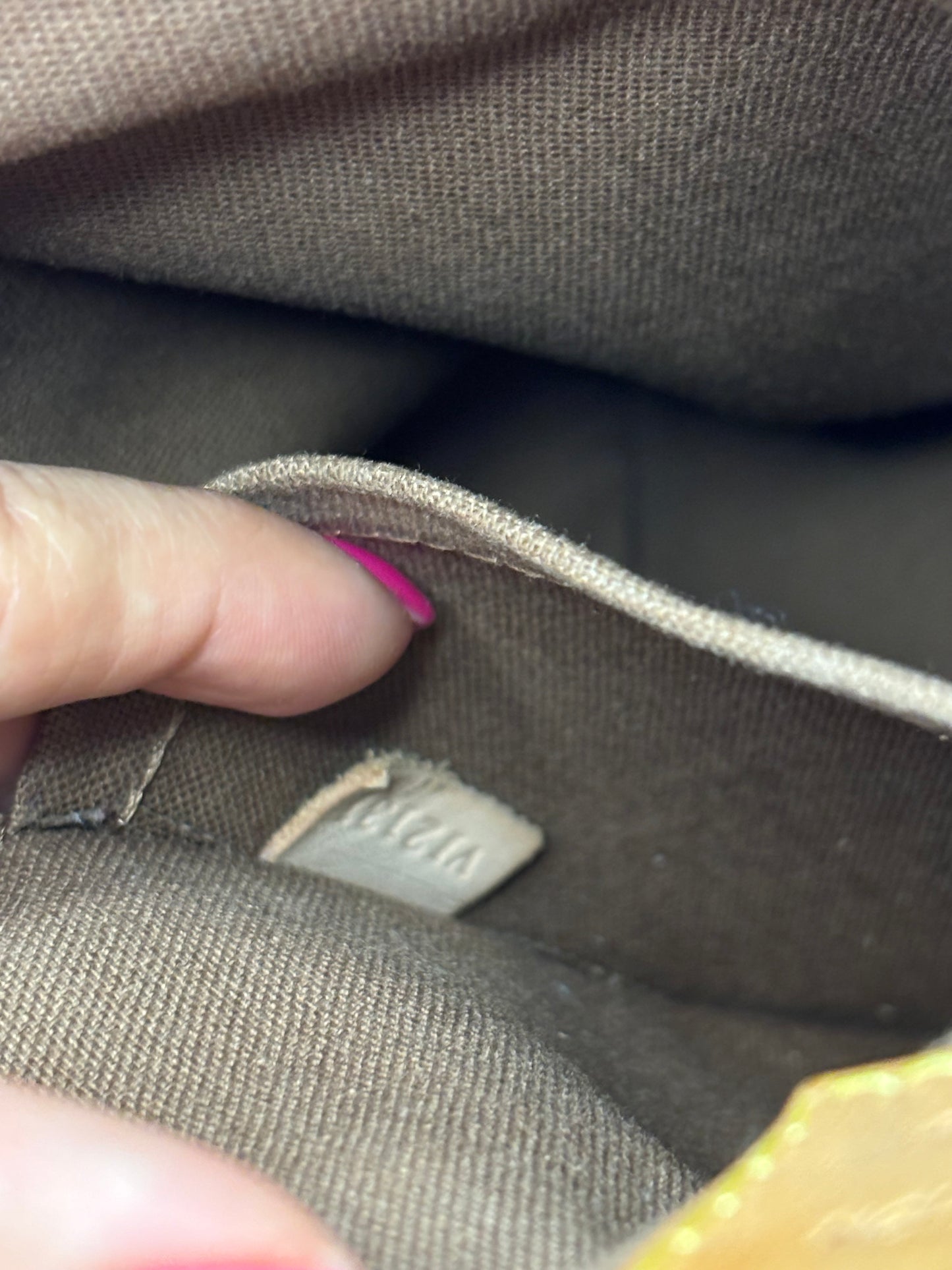 Louis Vuitton Tivoli Handbag