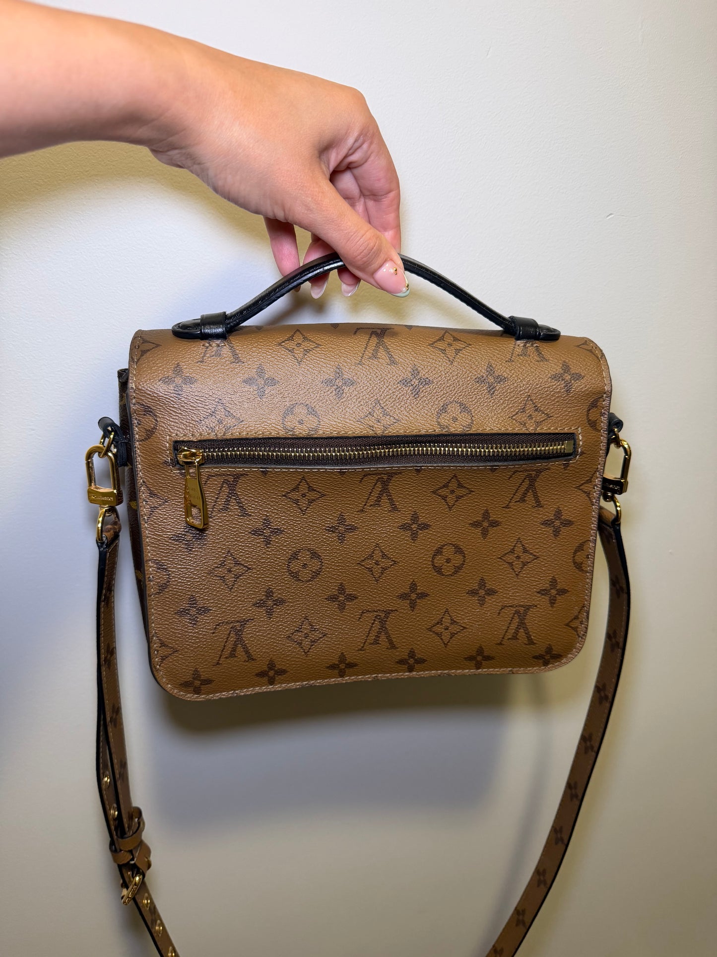Louis Vuitton Metis Reverse Monogram Crossbody Bag